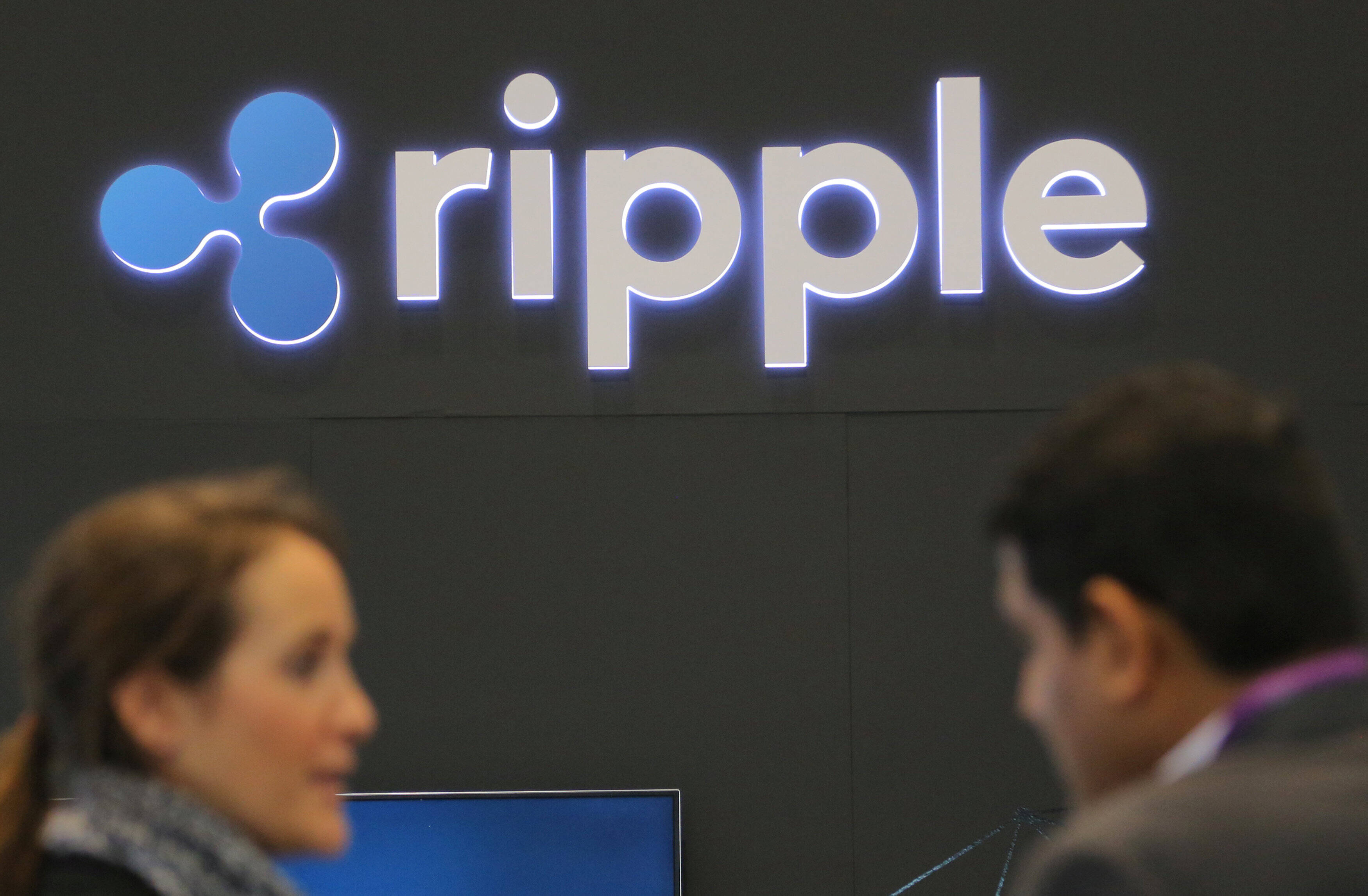 The logo of blockchain company Ripple is seen at the SIBOS banking and financial conference in Toronto, Ontario, Canada October 19, 2017. Picture taken October 19, 2017. REUTERS/Chris Helgren