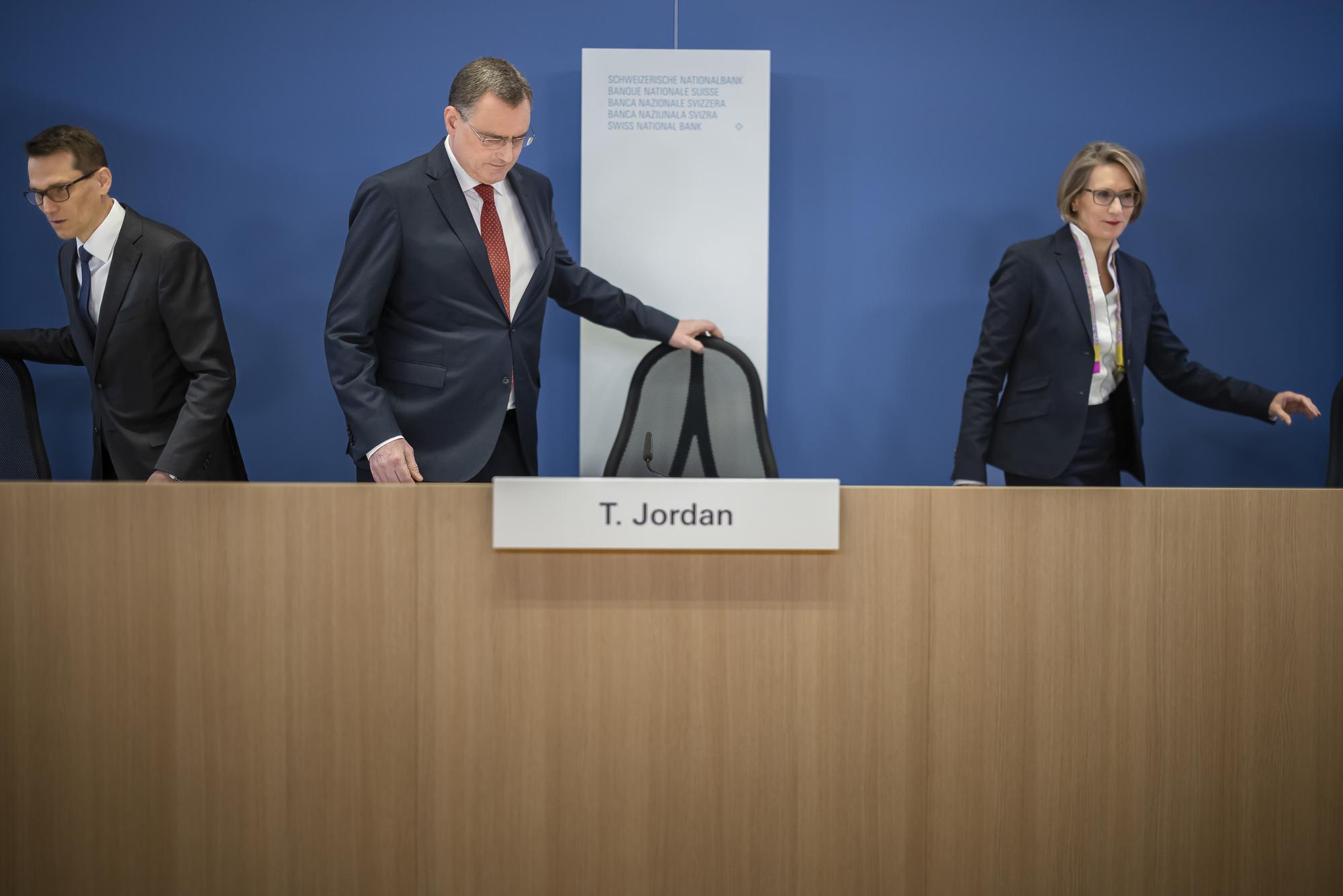 Swiss National Bank's (SNB) Vice Chairman of the Governing Board Martin Schlegel, Swiss National Bank's Chairman of the Governing Board Thomas Jordan and Member of the Governing Board Andrea Maechler, left to right, arrive to a media briefing at the Swiss National Bank in Zurich, Switzerland, on Thursday, September 22, 2022. (KEYSTONE/Michael Buholzer).