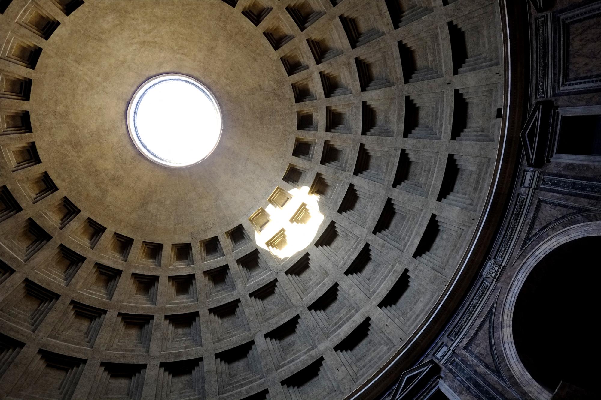 Sunlight enters in the Pantheon from the opening in the dome (oculus) on January 13, 2015 in Rome. AFP PHOTO / ANDREAS SOLARO (Photo by ANDREAS SOLARO / AFP)