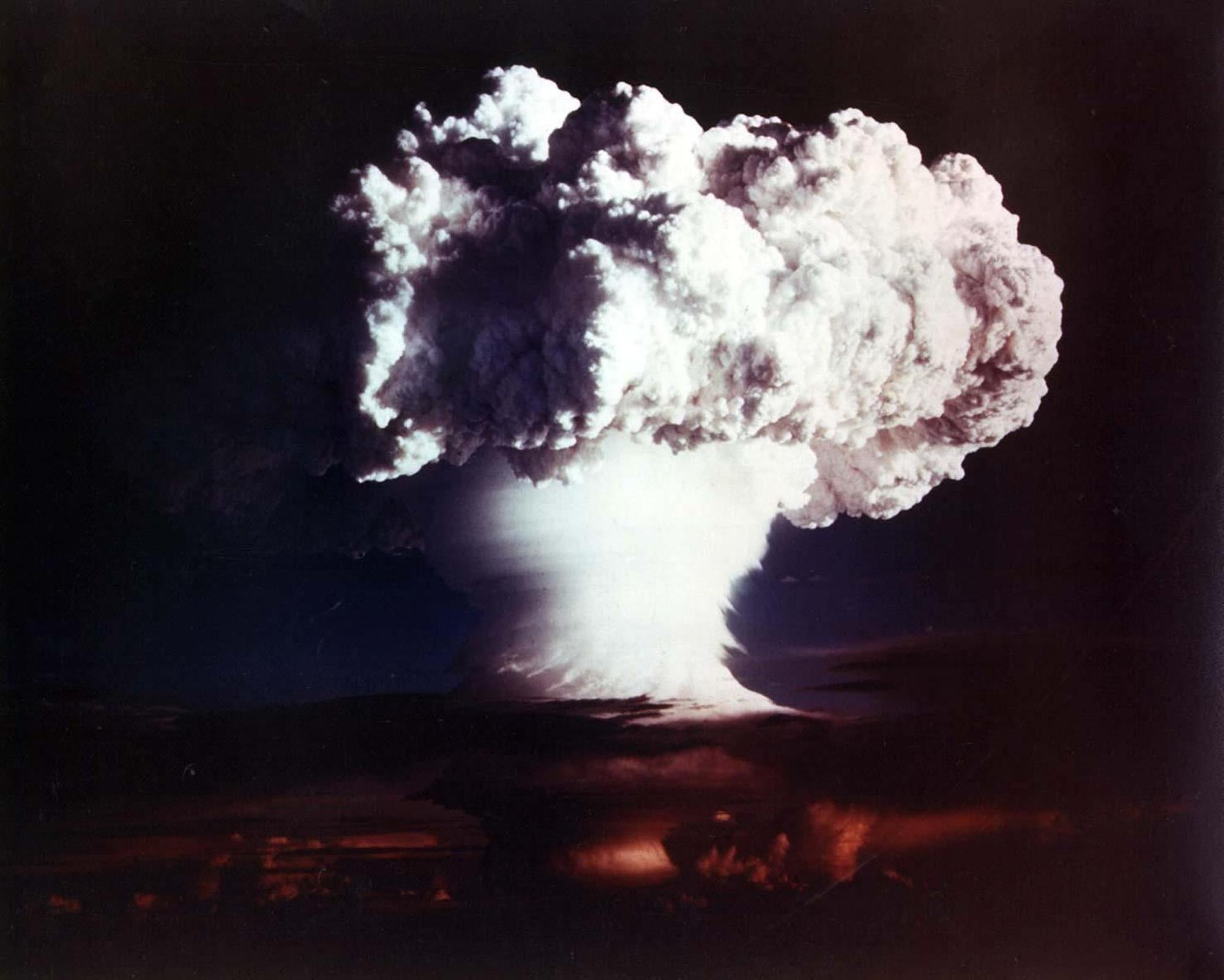 This US Department of Energy photo obtained October 28, 2002 shows the cloud from XX-58 IVY MIKE, an experimental thermonuclear device or H-bomb, that was fired on Elugelab Island in the Enewetak atoll November 1, 1952. The Mike device used liquid deuterium as the fusion fuel and created a fireball 3 miles wide. The "mushroom" cloud rose to 57,000 ft in 90 seconds, and topped out in 5 minutes at 135,000 ft - the top of the stratosphere- with a stem eight miles across. The detonation of Mike completely obliterated Elugelab, leaving an underwater crater of 6,240 feet wide and 164 ft deep in the atoll where an island had once been. (KEYSTONE/EPA/US DEPARTMENT OF ENERGY/Str)