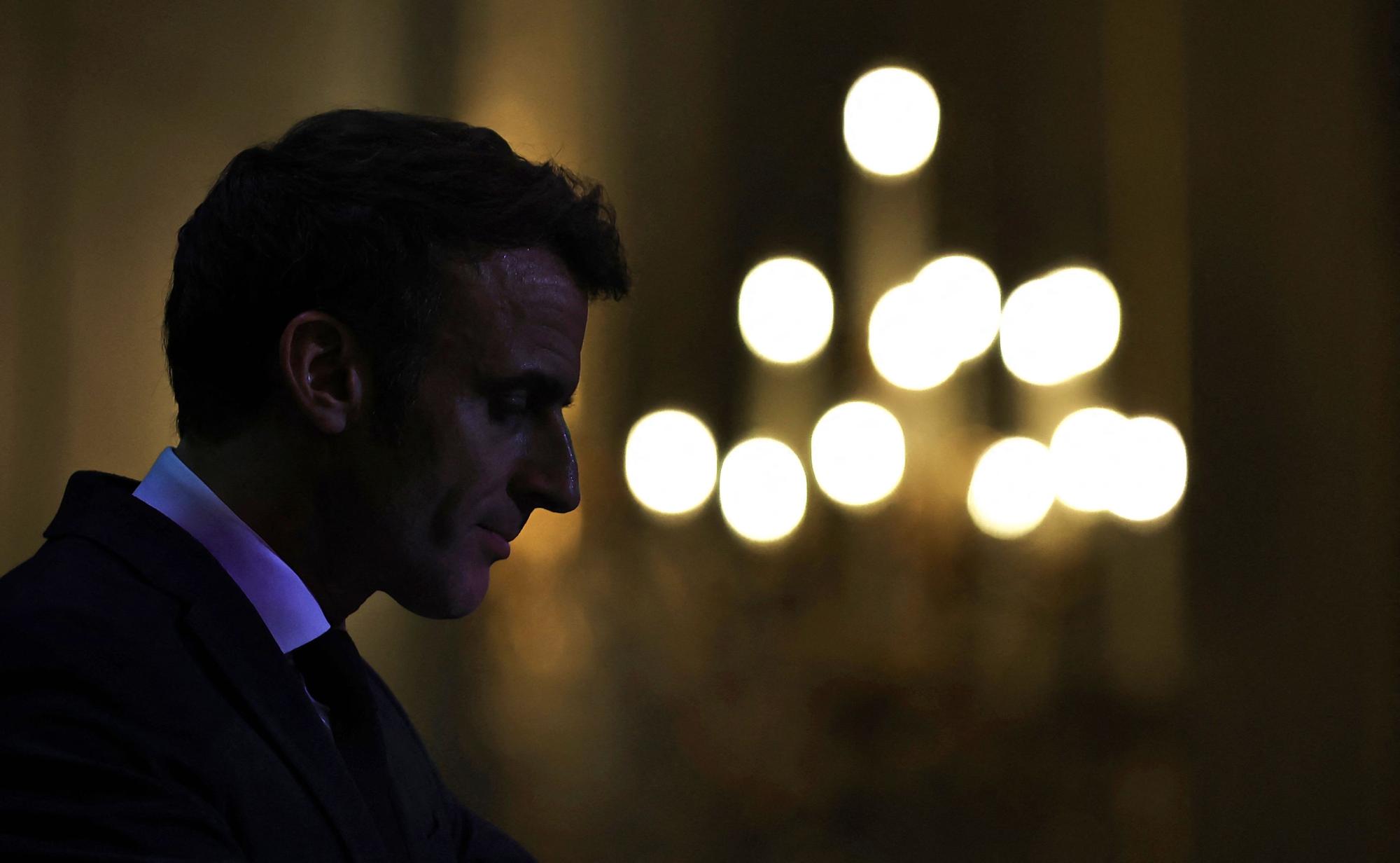 French President Emmanuel Macron delivers a speech during a ceremony with members of the Asian community in France to mark the Lunar New Year at the Elysee Palace in Paris on January 27, 2023. (Photo by Aurelien Morissard / POOL / AFP)