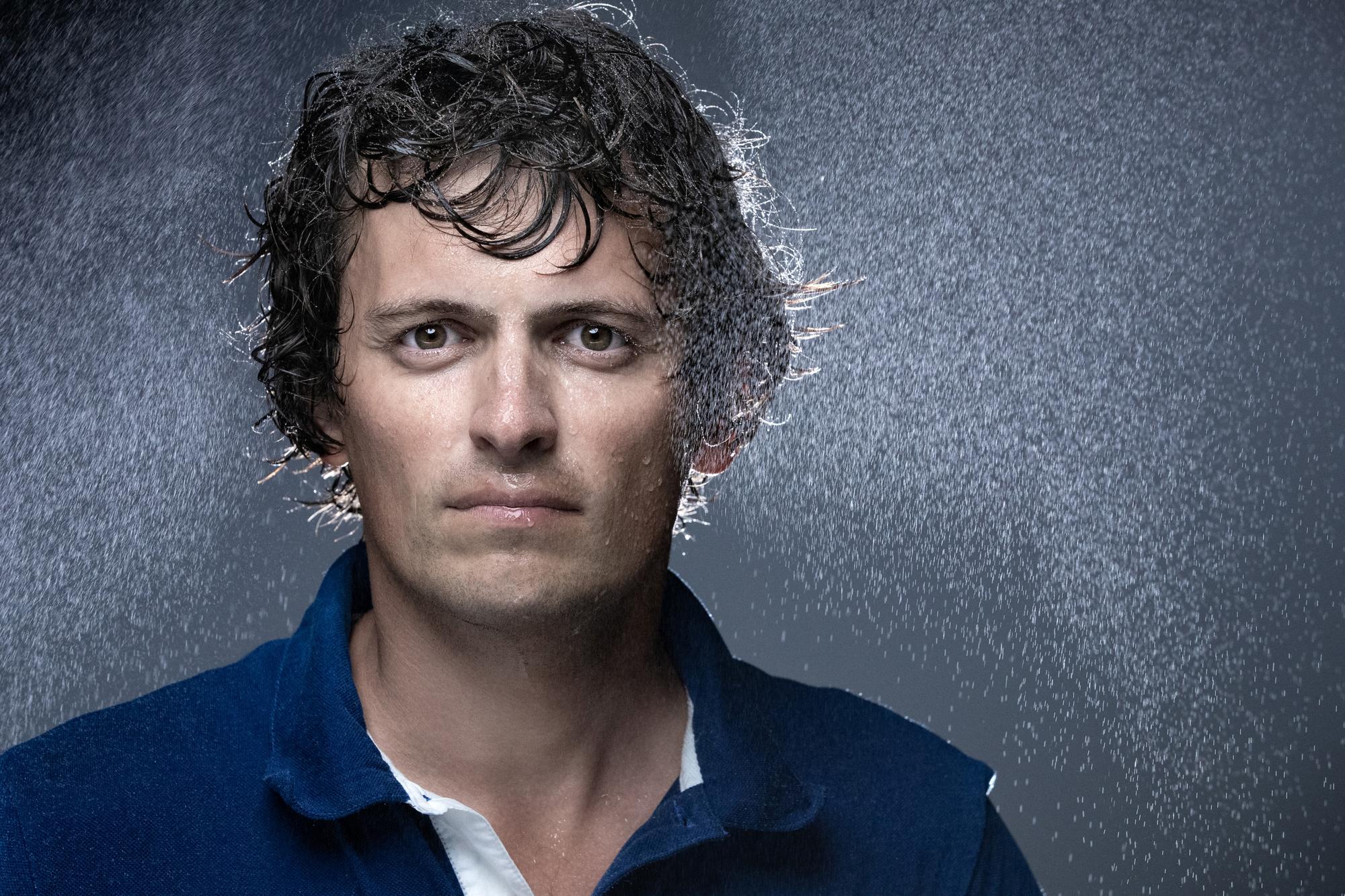 French skipper Everial Stanislas Thuret who will line up with the snowboarder Mathieu Crepel on the Transat Jacques Vabre offshore race, poses during a photo session in Paris on September 22, 2021. (Photo by JOEL SAGET / AFP)