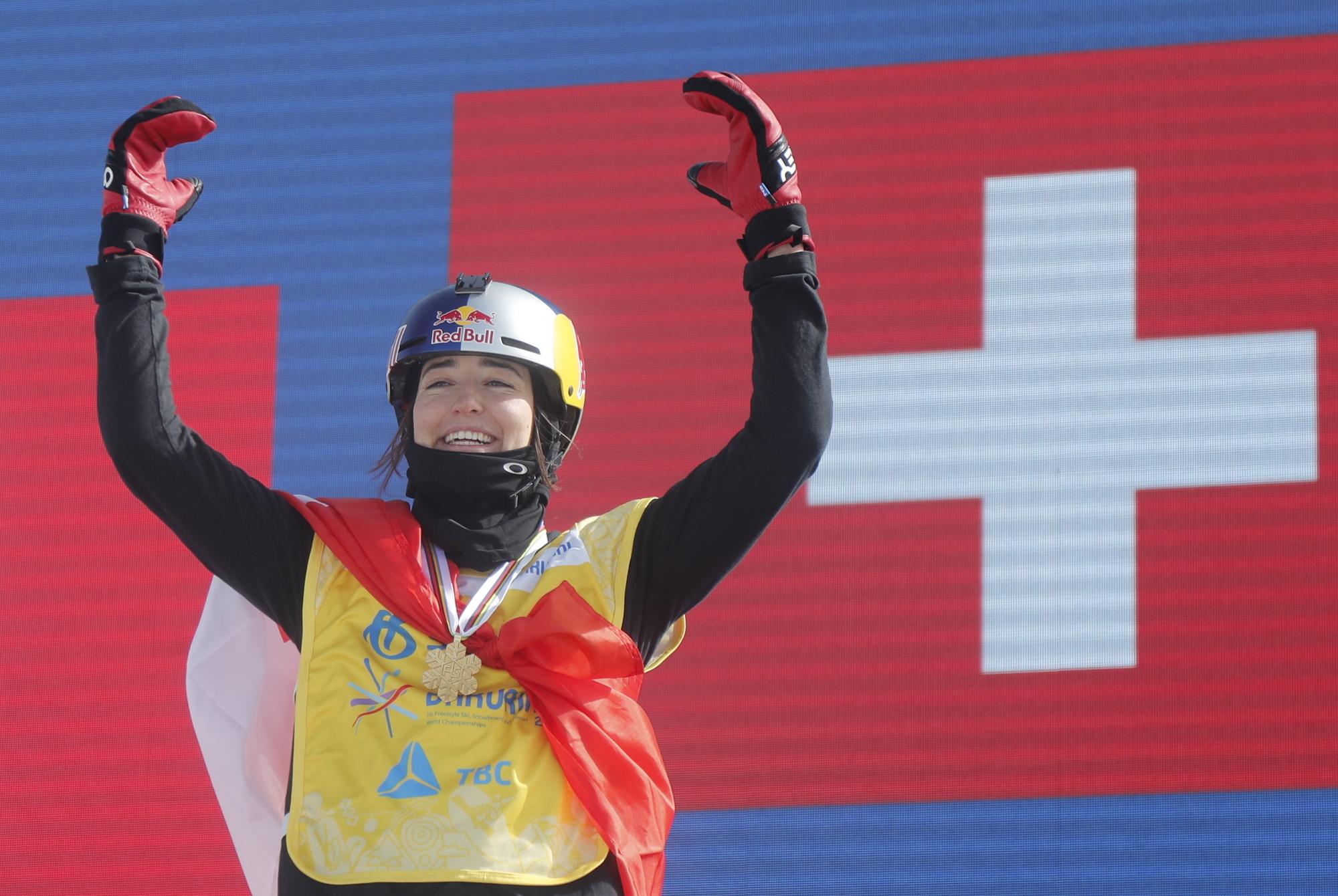 epa10494897 Gold medal winner Mathilde Gremaud of Switzerland celebrates during the award ceremony of the Women's Freeski Slopestyle competition at the FIS Snowboard, Freestyle and Freeski World Championships in Bakuriani, Georgia, 28 February 2023. EPA/ZURAB KURTSIKIDZE