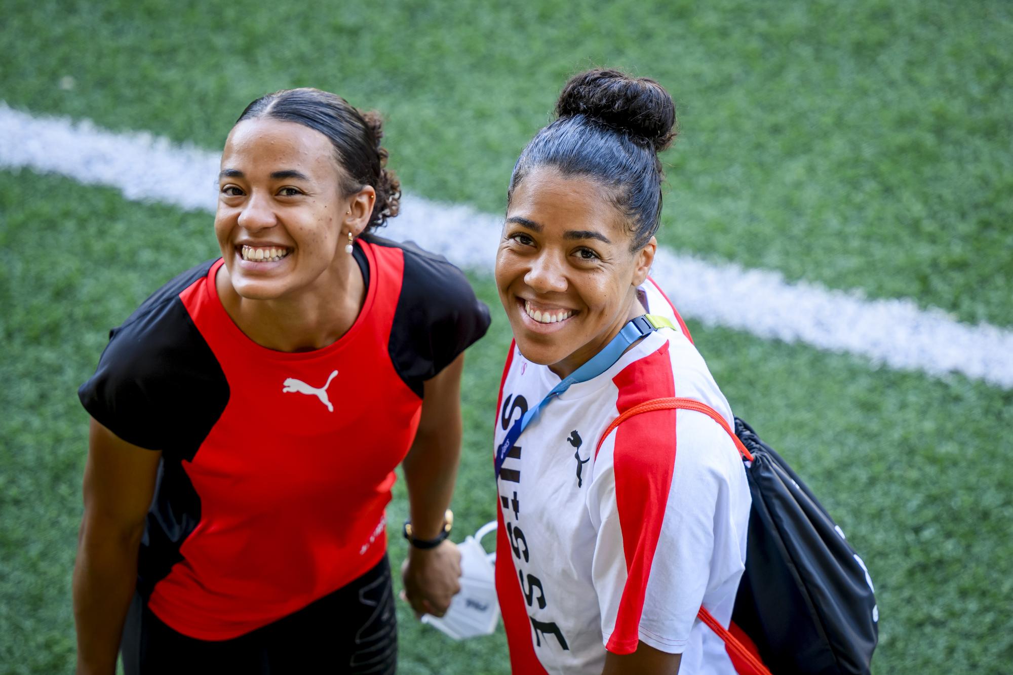 Ditaji Kambundji and Mujinga Kambundji of Switzerland react during the IAAF World Athletics Championships, at the Hayward Field stadium, in Eugene, United States, Thursday, July 14, 2022. (KEYSTONE/Jean-Christophe Bott)