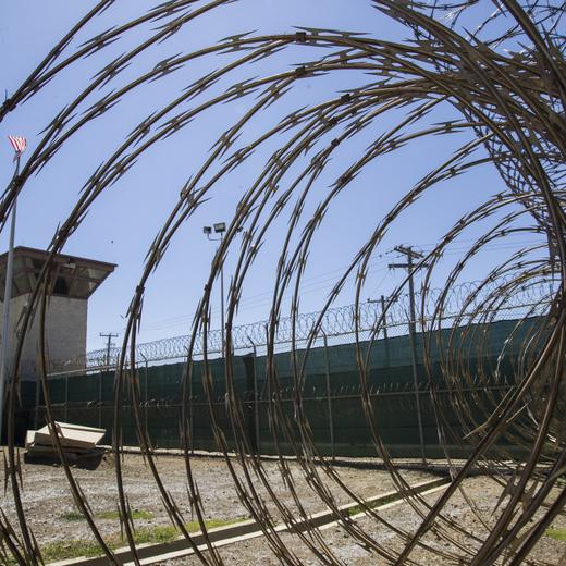 FILE - In this April 17, 2019, photo, reviewed by U.S. military officials, the control tower is seen through the razor wire inside the Camp VI detention facility in Guantanamo Bay Naval Base, Cuba. U.S. military officials said Wednesday, March 8, 2023, they had returned a suspected al-Qaida operative long held at a military prison at Guantanamo Bay, Cuba, to his home country, Saudi Arabia. (AP Photo/Alex Brandon, File)