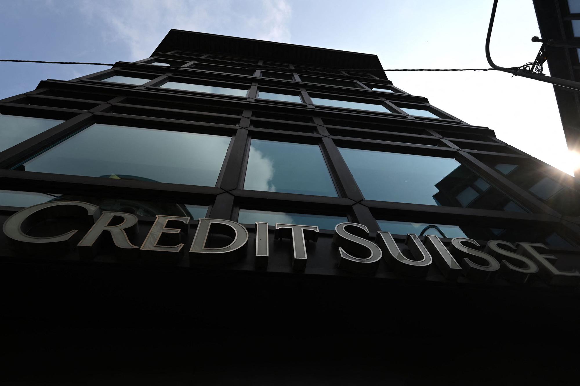 A photo taken on March 20, 2023 shows a branch of Swiss bank Credit Suisse in downtown Milan. - Switzerland's largest bank UBS agreed to take over Credit Suisse for $3 billion Swiss francs ($3.25 billion) in a government-brokered deal over the weekend following days of market upheaval over the health of the banking sector. (Photo by GABRIEL BOUYS / AFP)