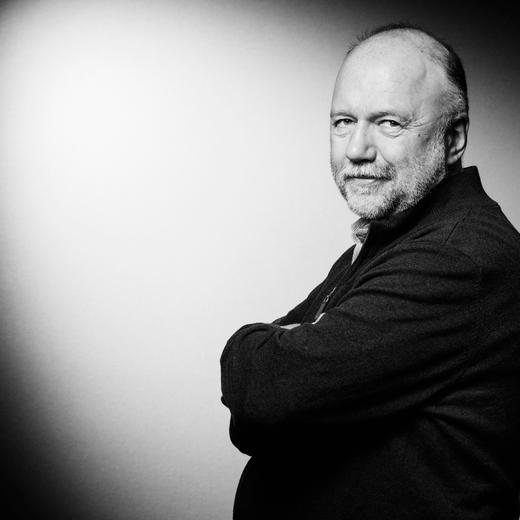 Ukrainian writer Andrey Kurkov (Andrei Kourkov) poses during a photo session in Paris on March 17, 2018. (Photo by JOEL SAGET / AFP) / BLACK AND WHITE VERSION
