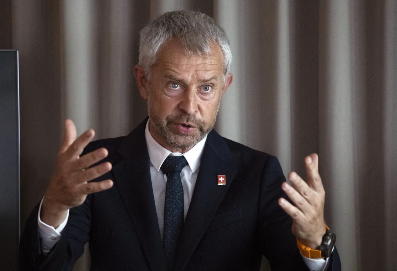 Ambassador and Head of Presence Switzerland Nicolas Bideau speaks during an opening ceremony of Switzerland's new embassy in Moscow, Tuesday, June 18, 2019. Raccoursier created a work 'Bi-Location'which sees an apple tree planted in the courtyard of the new embassy linked with other 'sibling trees' planted across Switzerland. (AP Photo/Pavel Golovkin)