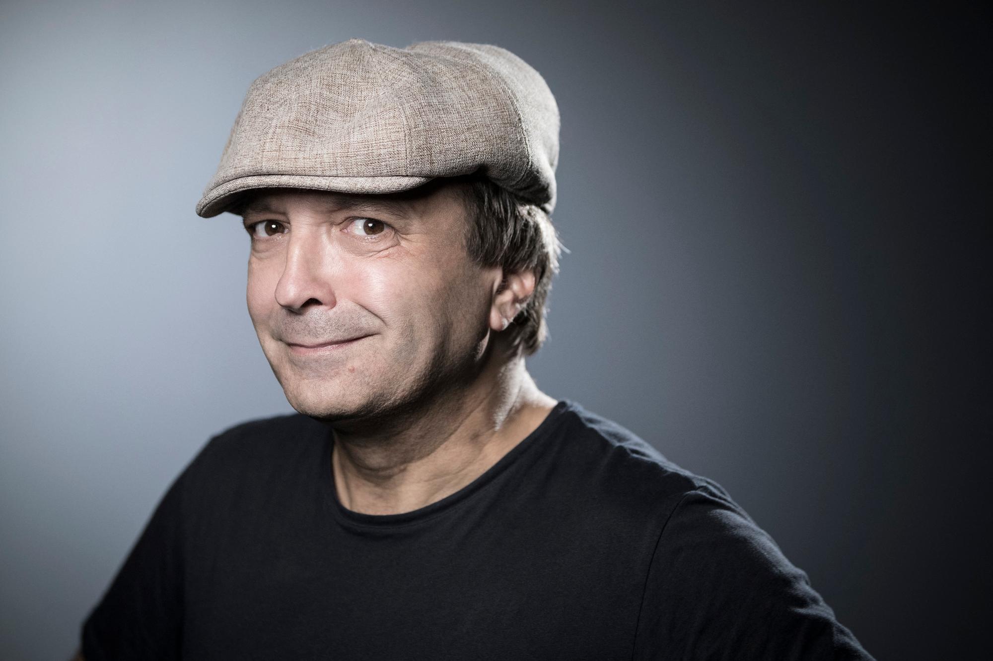 French comics artist Emile Bravo poses during a photo session in Paris on June 15, 2018. (Photo by JOEL SAGET / AFP)