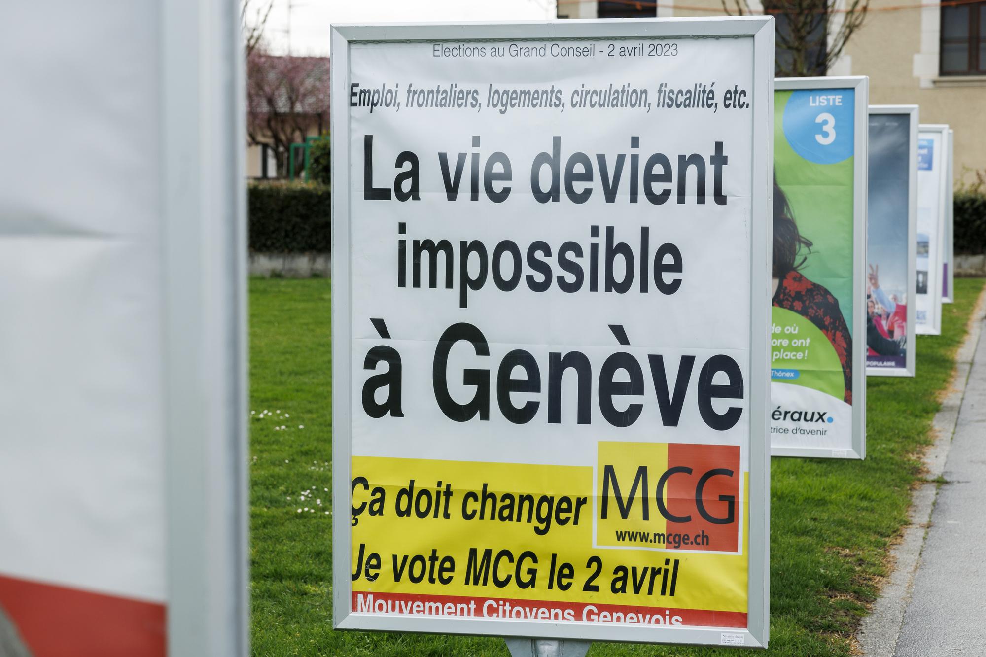 L'affiche electorale du MCG pour l'election du Grand Conseil photographiee, ce dimanche 26 mars 2023 a Geneve. Les citoyens genevois voteront pour l'election du Grand Conseil et pour le premier tour de l'election du Conseil d'Etat du dimanche 2 avril 2023. (KEYSTONE/Salvatore Di Nolfi)