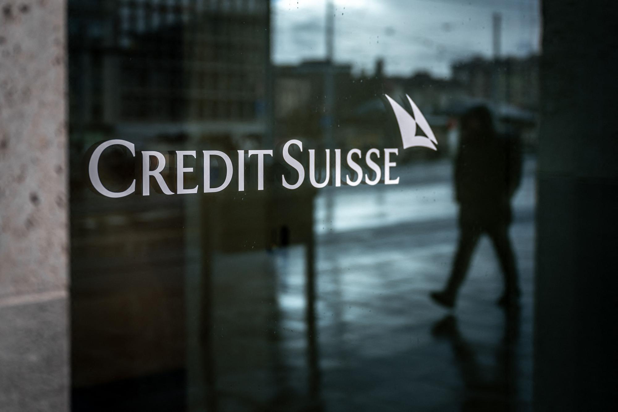(FILES) In this file photo taken on March 24, 2023 shows a sign of Credit Suisse bank. - Embattled Swiss banking giant Credit Suisse has failed to disclose more than $700 million in previously undeclared accounts since 2014, in violation of a plea deal with the US Department of Justice, a Senate committee said on March 29, 2023. The findings of the two-year Senate Finance Committee probe add to the woes of the Swiss investment bank, which was pushed to merge with regional rival UBS earlier this month after suffering contagion from the collapse of Silicon Valley Bank. (Photo by Fabrice COFFRINI / AFP)