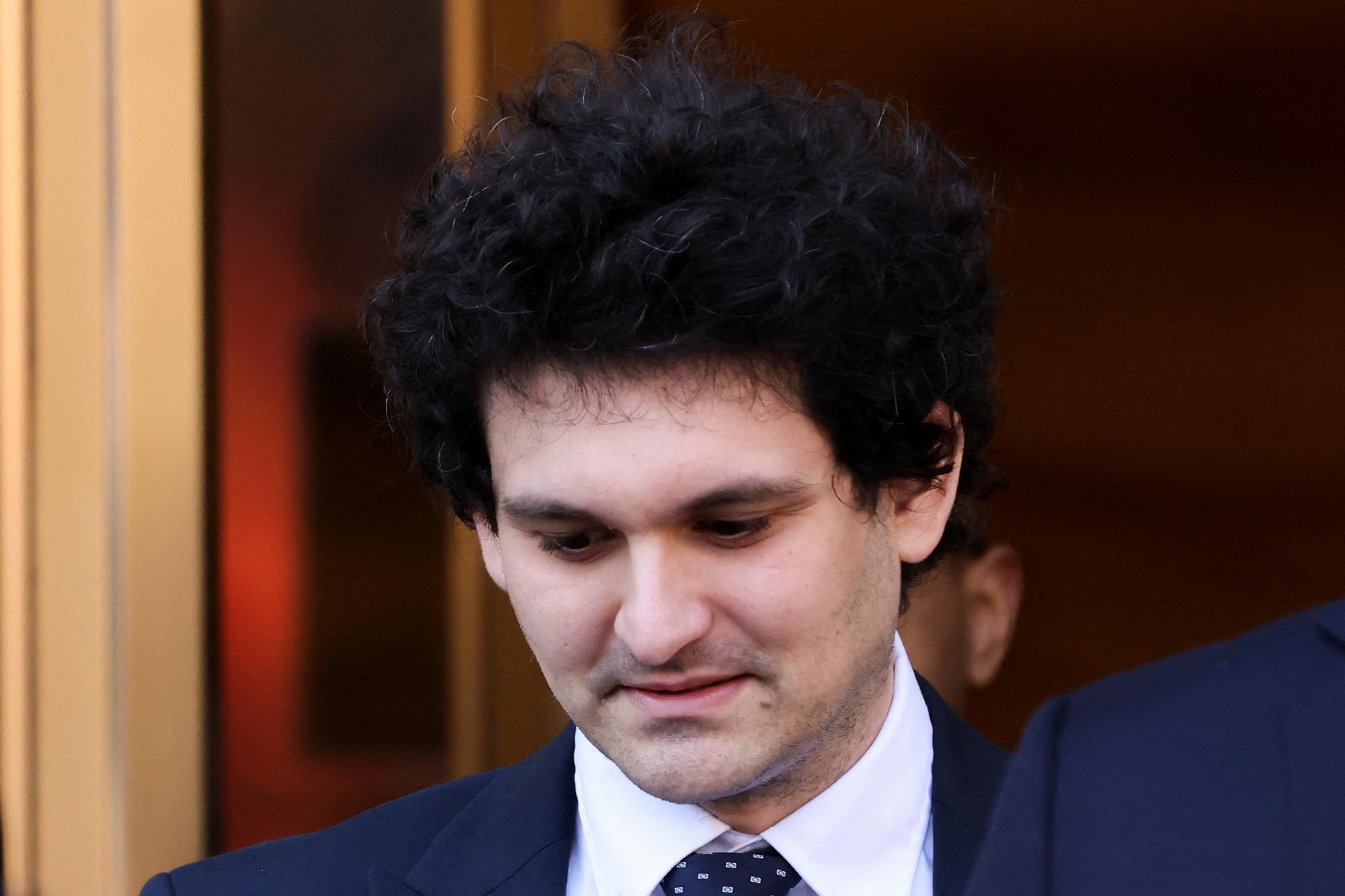 Former FTX Chief Executive Sam Bankman-Fried, who faces fraud charges over the collapse of the bankrupt cryptocurrency exchange, leaves the Manhattan federal court in New York City, U.S. March 30, 2023. REUTERS/Andrew Kelly