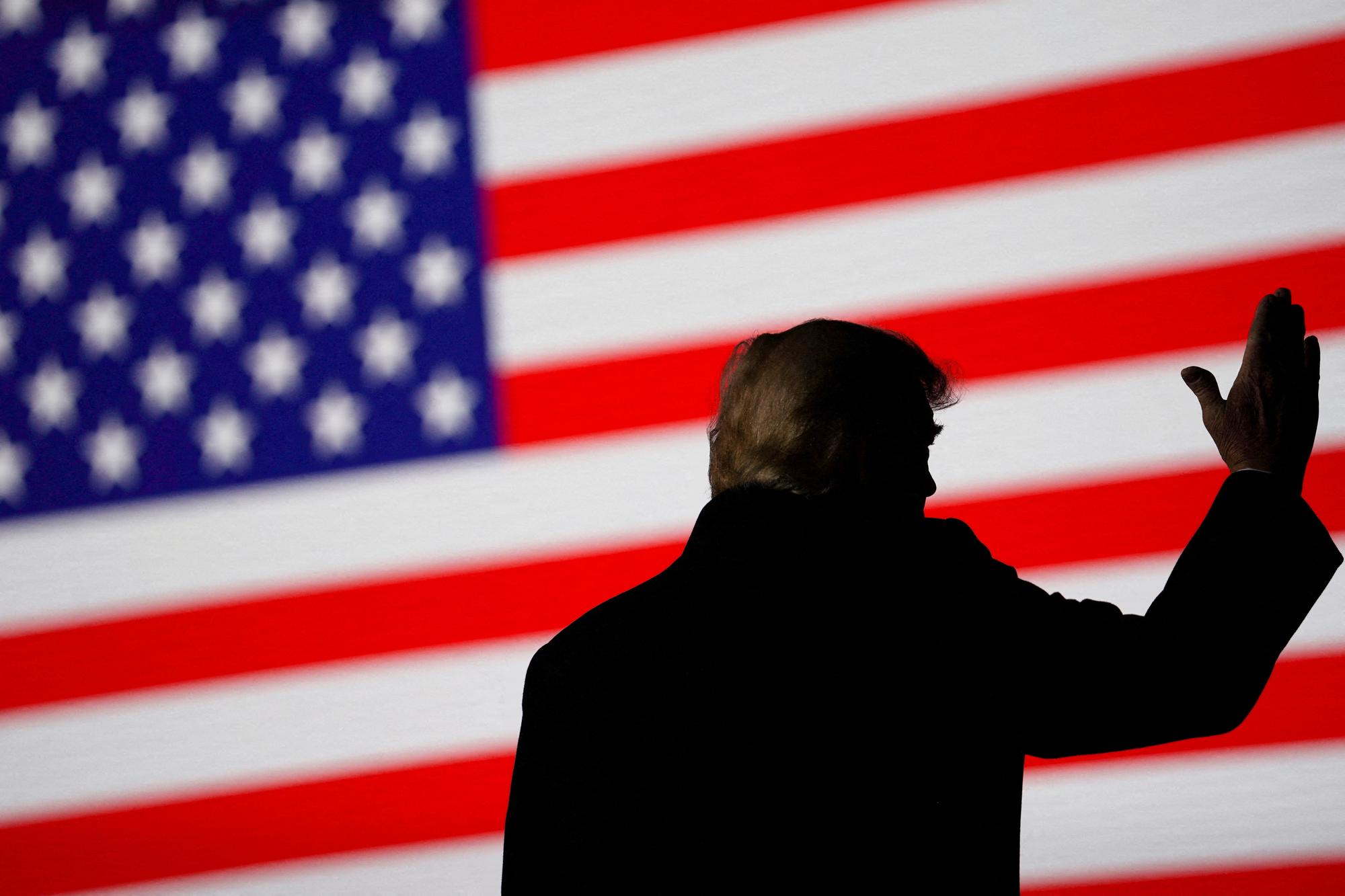 FILE PHOTO: Former U.S. President Donald Trump gestures during a rally in Conroe, Texas, U.S., January 29, 2022. REUTERS/Go Nakamura/File Photo
