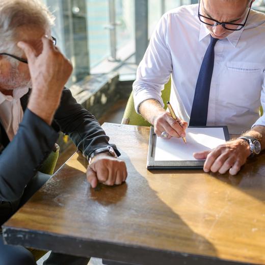 Businessman discussion and sign business the contract agreement.