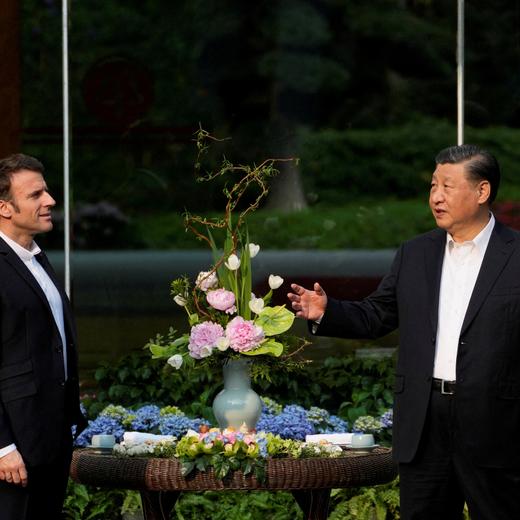 Chinese President Xi Jinping and France's President Emmanuel Macron attend a tea ceremony at the Guandong province governor's residence, in Guangzhou, China, Friday, April 7, 2023. Thibault Camus/Pool via REUTERS