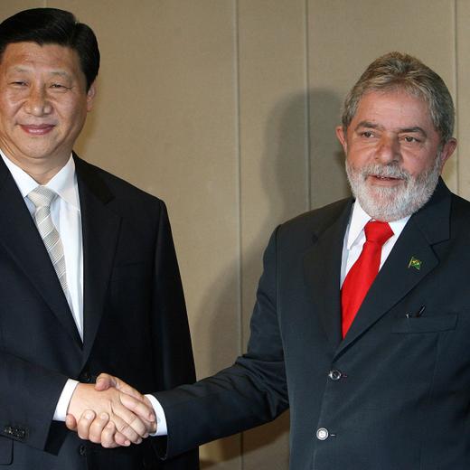 (FILES) In this file photo taken on February 19, 2009, Chinese Vice-President Xi Jinping (L) shakes hands with Brazilian President Luiz Inacio Lula da Silva, during a meeting in Brasilia. - Brazil's leftist leader Luiz Inacio Lula da Silva will travel to China on April 11, 2023, to meet President Xi Jinping, after having to cancel his trip in March after coming down with pneumonia. Lula hopes to reinforce trade, discuss international mediation in Ukraine, and reclaim his country's role in global geopolitics. (Photo by JOEDSON ALVES / AFP)