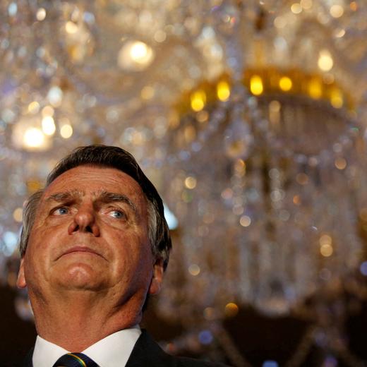 FILE PHOTO: Former Brazilian President Jair Bolsonaro looks on during "Power of The People" event hosted by Turning Point USA at Trump National Doral Miami Resort in Doral, Florida, U.S., February 3, 2023. REUTERS/Marco Bello/File Photo