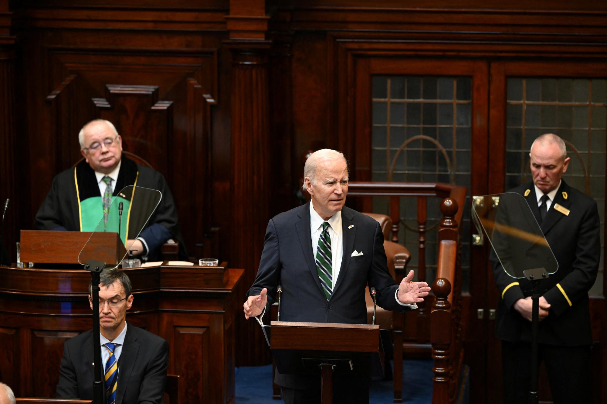 U.S. President Joe Biden addresses the Houses of the Oireachtas at Leinster House, Dublin, Ireland, April 13, 2023. Kenny Holston/Pool via REUTERS