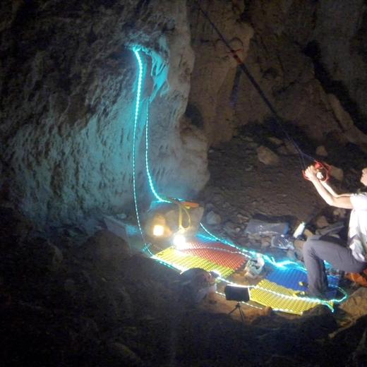 Beatriz Flamini, a Spanish mountaineer who has been isolated for 500 days in a cave is pictured during her daily life at the cave in Motril, Spain in this screen grab taken from a handout video from November 2021. Dokumalia Producciones/Handout via REUTERS. THIS IMAGE HAS BEEN SUPPLIED BY A THIRD PARTY. MANDATORY CREDIT. NO RESALES. NO ARCHIVES