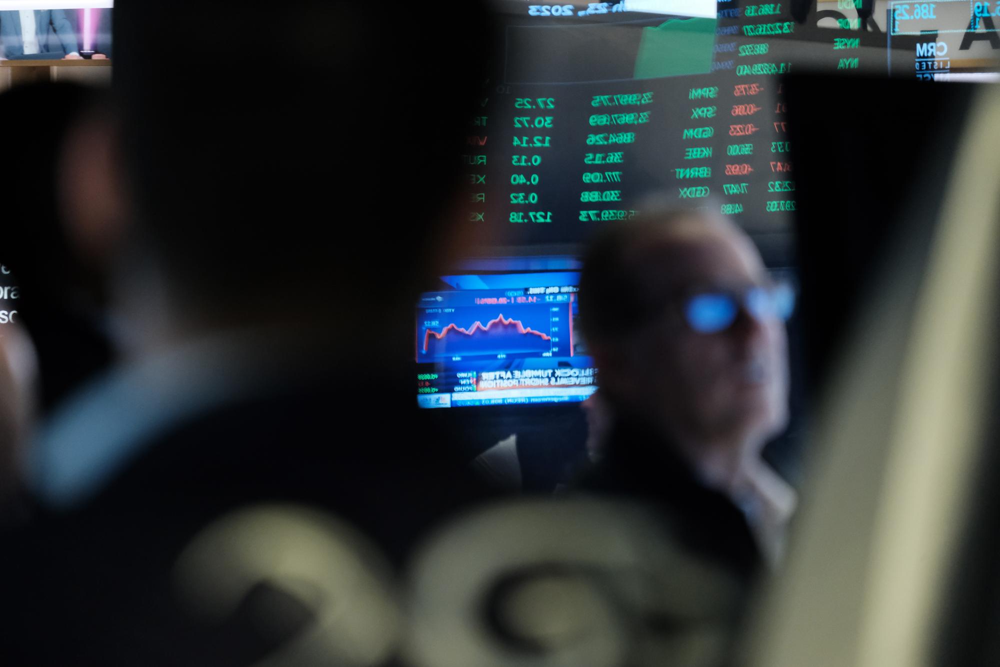 NEW YORK, NEW YORK - MARCH 23: Traders work on the floor of the New York Stock Exchange (NYSE) on March 23, 2023 in New York City. The Dow was up over 200 points in morning trading a day after the Federal Reserve once again raised interest rates in an attempt to control inflation. (Photo by Spencer Platt/Getty Images)