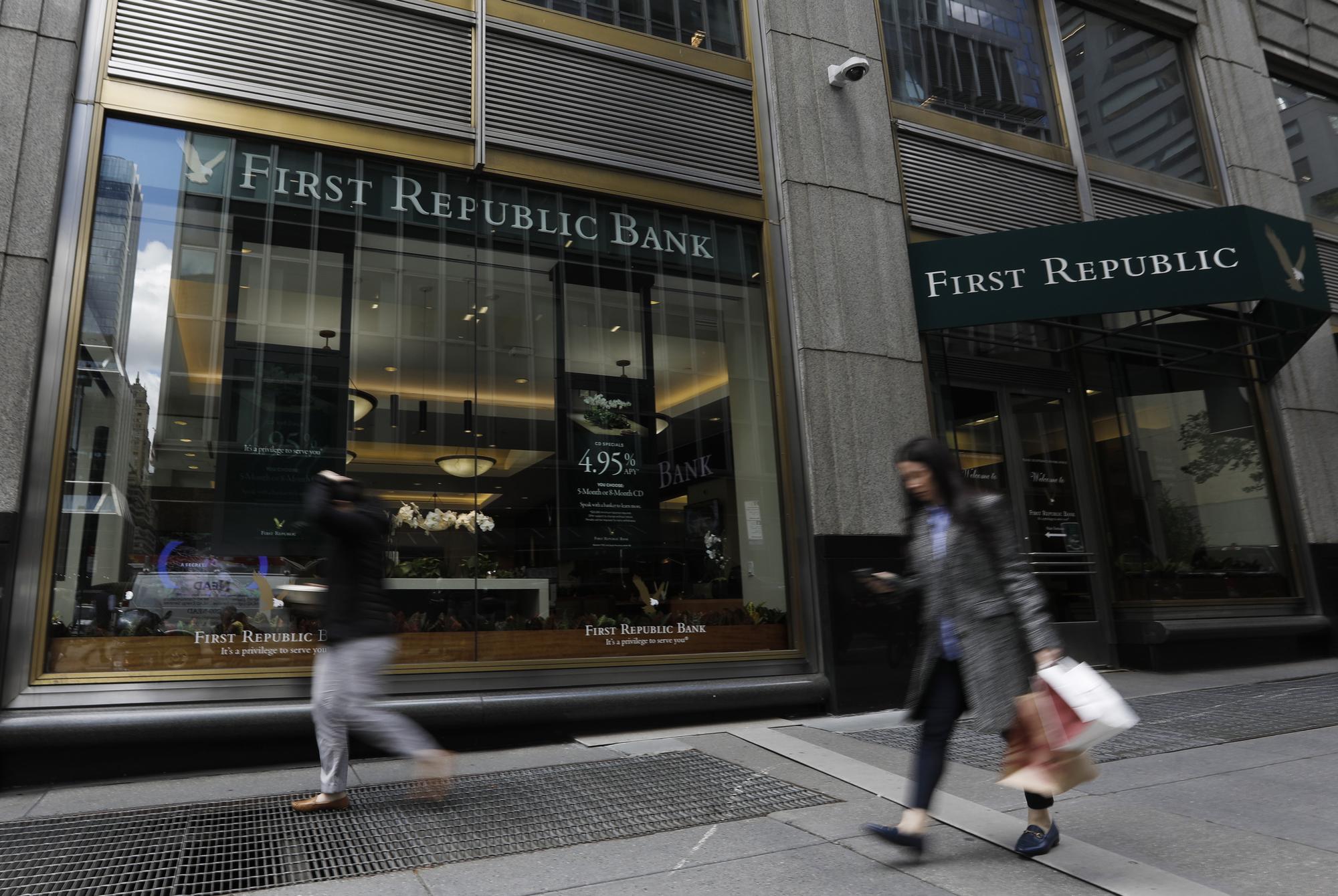 epa10602635 Pedestrians pass by a branch of First Republic Bank on Park Avenue in New York, New York, USA, 01 May 2023. The Federal Deposit Insurance Corporation (FDIC) announced it sold the failing First Republic Bank to JP Morgan Chase & Co shortly before markets were set to open. First Republic Bank is the second-largest bank failure in US history. EPA/Peter Foley