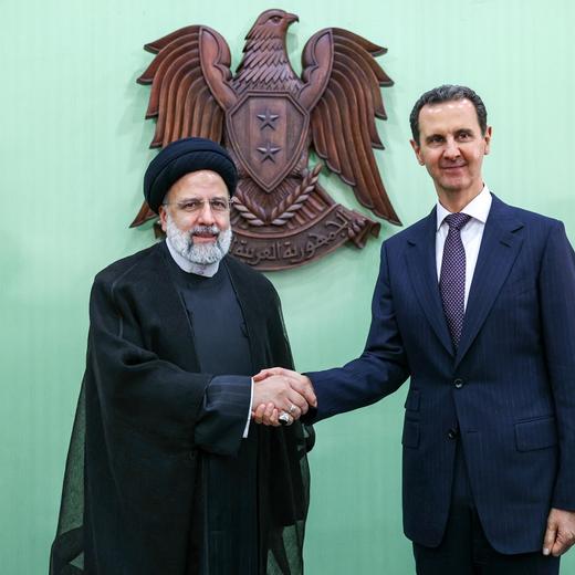 epa10606473 A handout picture made available by the Iranian presidential office shows Iranian President Ebrahim Raisi (L) and his Syrian counterpart Bashar Assad (R) shaking hands during press conference in Damascus, Syria, 03 May 2023. Raisi, the first Iranian president to visit Damascus since war erupted in Syria in 2011, had talks with his Syrian counterpart and signed a memorandum of understanding for a comprehensive long-term strategic cooperation plan between the two countries. EPA/IRANIAN PRESIDENCY OFFICE / HANDOUT HANDOUT EDITORIAL USE ONLY/NO SALES