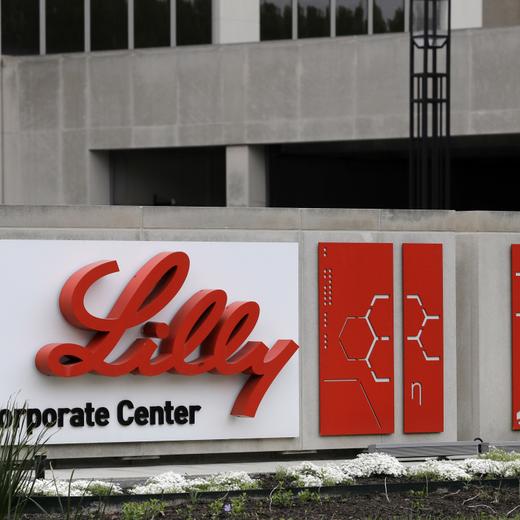 FILE - A sign for Eli Lilly & Co. sits outside their corporate headquarters in Indianapolis on April 26, 2017. The company said Wednesday, May 3, 2023, that its experimental Alzheimer?s drug appeared to slow worsening of the mind-robbing disease in a large study. (AP Photo/Darron Cummings, File)