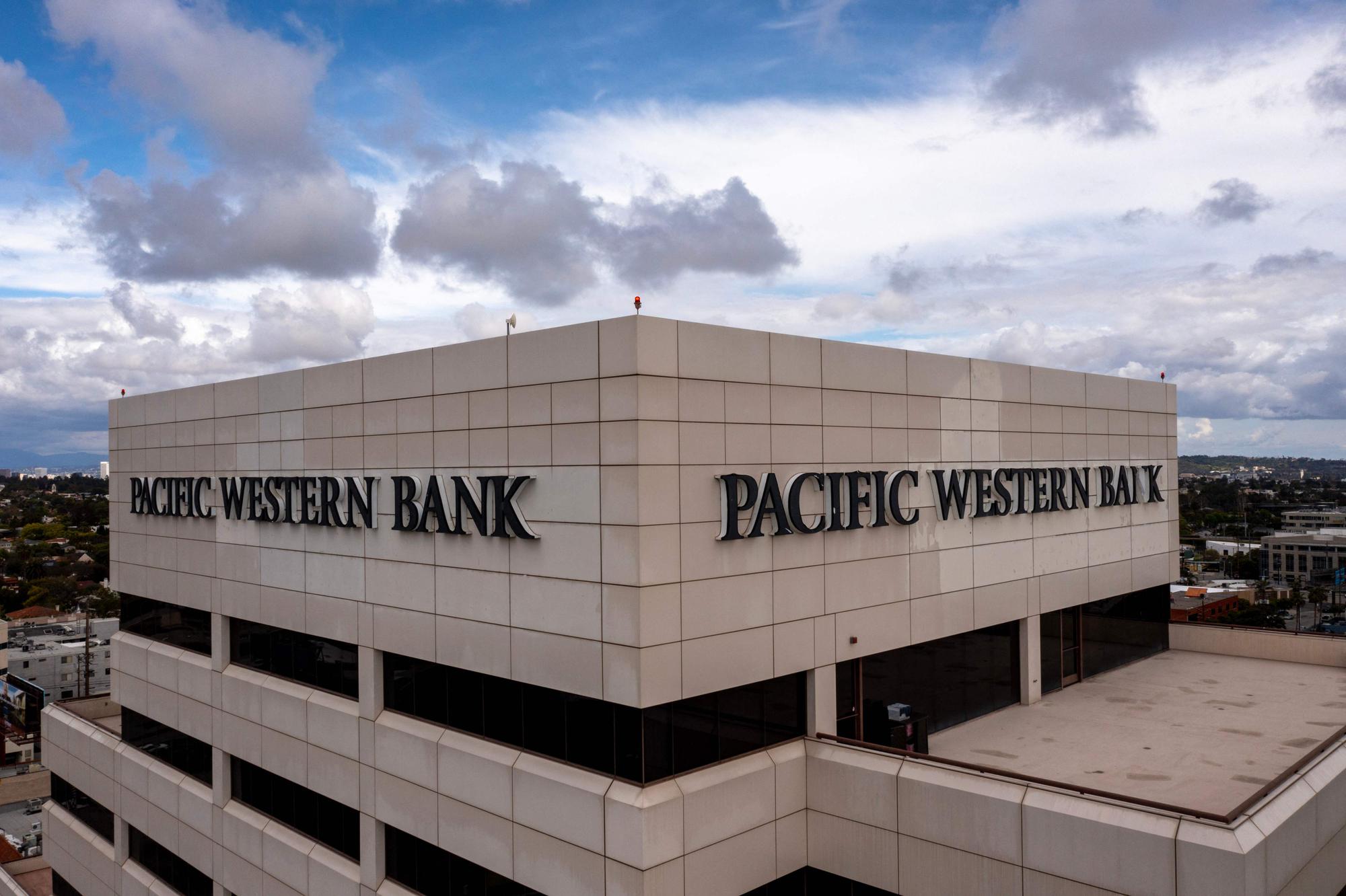 LOS ANGELES, CALIFORNIA - MAY 4: In an aerial view, a Pacific Western Bank building is seen on May 4, 2023 in Los Angeles, California. Pacific Western Bank's stock plunged Thursday in the wake of other bank failures. Following an unusual outflow of deposits this week, PacWest Bancorp says it plans to sell a $2.7 billion loan portfolio. David McNew/Getty Images/AFP (Photo by DAVID MCNEW / GETTY IMAGES NORTH AMERICA / Getty Images via AFP)