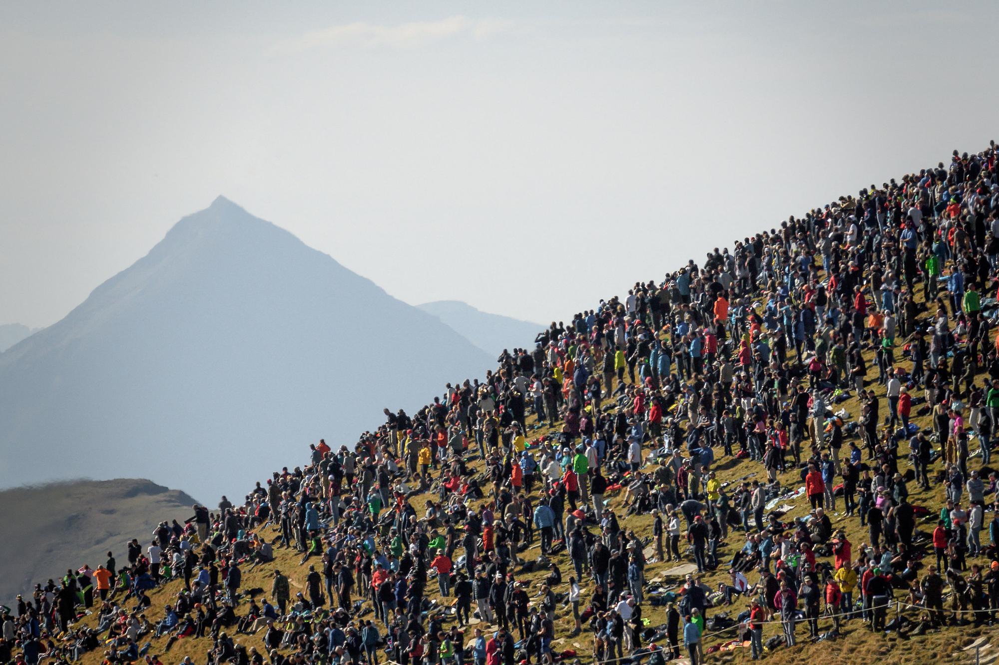 A F/A-18 Hornet fighter aircraft flies over spertators during the annual live fire event of the Swiss Air Force at the Axalp, over Brienz in the Bernese Alps on October 10, 2018. - At an altitude of 2,200 meters above sea level, spectators attended a unique aviation display performed at the highest air force firing range in Europe. (Photo by Fabrice COFFRINI / AFP)