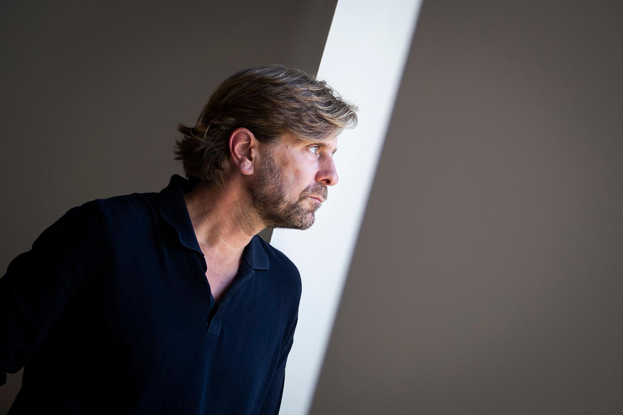 Swedish film director Ruben Ostlund poses at his house in Campos, on the Balearic island of Mallorca, on April 18, 2023. - Four weeks before the opening of the Cannes Film Festival, the president of the jury, the 49-year-old Swedish filmmaker Ruben Ostlund, famous for his scathing comedies that tarnish the facade of Western societies, is impatiently waiting for the magic to work, he confessed in an exclusive interview with AFP. (Photo by JAIME REINA / AFP)