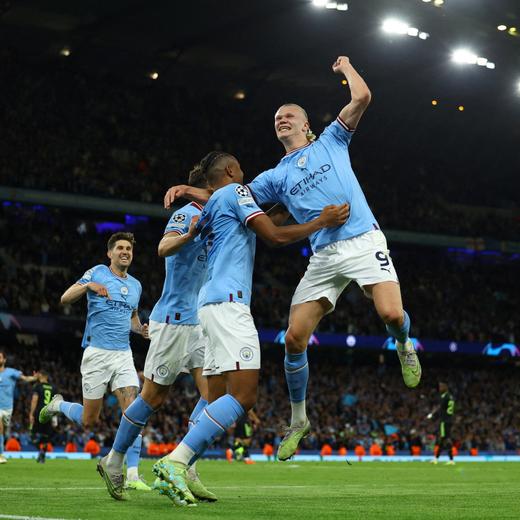 Soccer Football - Champions League - Semi Final - Second Leg - Manchester City v Real Madrid - Etihad Stadium, Manchester, Britain - May 17, 2023  Manchester City's John Stones, Erling Braut Haaland, Manuel Akanji and Ruben Dias celebrate their third goal an own goal scored by Real Madrid's Eder Militao REUTERS/Molly Darlington TPX IMAGES OF THE DAY