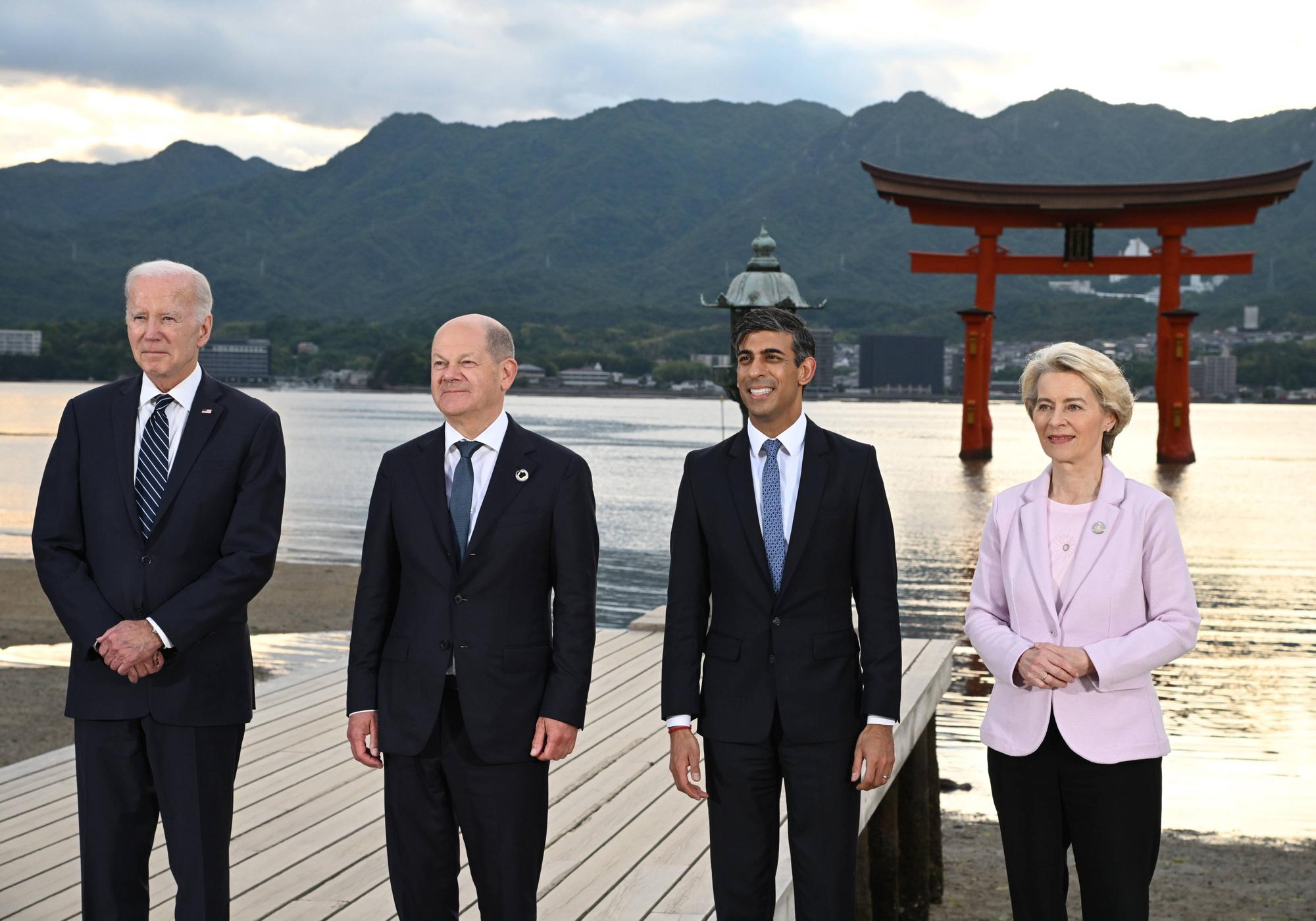 From left to right, US President Joe Biden, German Chancellor Olaf Scholz, UK Prime Minister Rishi Sunak and European Commission President Ursula von der Leyen, pose for the a group photo at the Itsukushima Shrine during the G7 Summit, on Friday, May 19, 2023 in Hiroshima, Japan. The members of the G7 US, Canada, France, Germany, Japan, the United Kingdom and Italy meet in the Japanese city of Hiroshima on Thursday for an annual summit. The leaders talk will focus on Russias war on Ukraine, Chinas rising power and influence, nuclear disarmament, artificial intelligence, climate change and economic security. PUBLICATIONxINxGERxSUIxAUTxHUNxONLY JAP2023051976 G7xHiroshimaxSummit