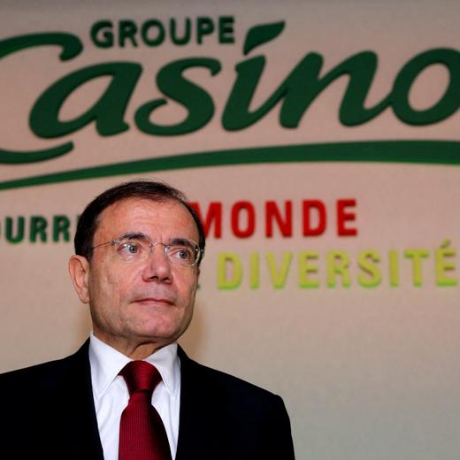 FILE PHOTO: Jean-Charles Naouri, Chairman and Chief Executive of French retailer Casino, poses following the company's 2012 annual results presentation in Paris February 21, 2013. REUTERS/Philippe Wojazer/File Photo
