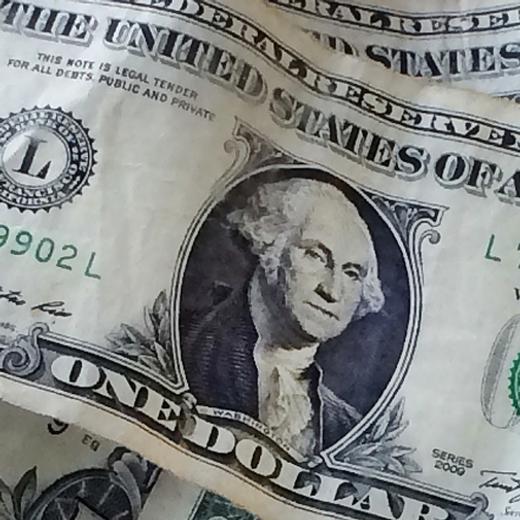 Image d'illustration. Des billets d'un dollar à New York, le 24 octobre 2016.