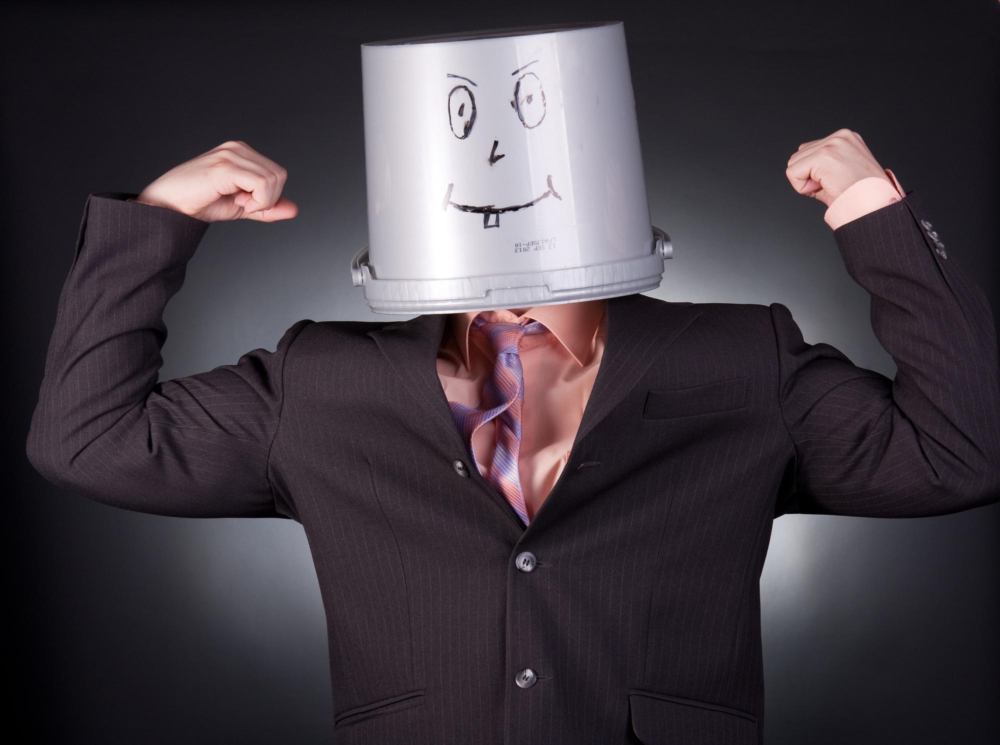 funny businessman with a bucket on his head