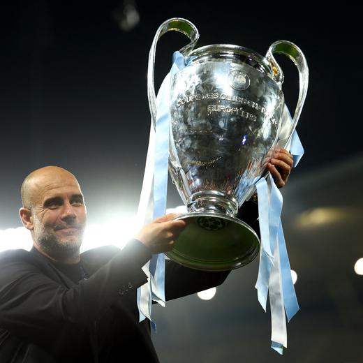Soccer Football - Champions League Final - Manchester City v Inter Milan - Ataturk Olympic Stadium, Istanbul, Turkey - June 11, 2023  Manchester City manager Pep Guardiola celebrates with the trophy after winning the Champions League REUTERS/Molly Darlington