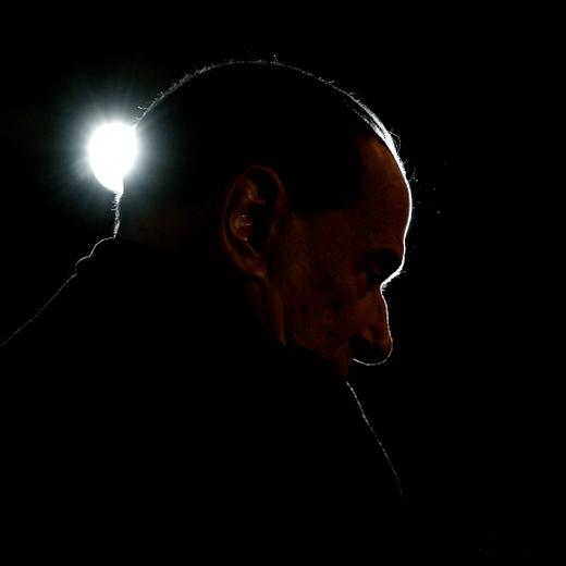 (FILES) This file photo taken on February 25, 2018 shows the silhouette of the leader of the Italian right-wing party Forza Italia (Go Italy) Silvio Berlusconi during a campaign rally in Milan. Silvio Berlusconi, the former prime minister who reshaped Italy's political and cultural landscape has died aged 86, his spokesman confirmed to AFP on June 12, 2023. (Photo by Piero CRUCIATTI / AFP)