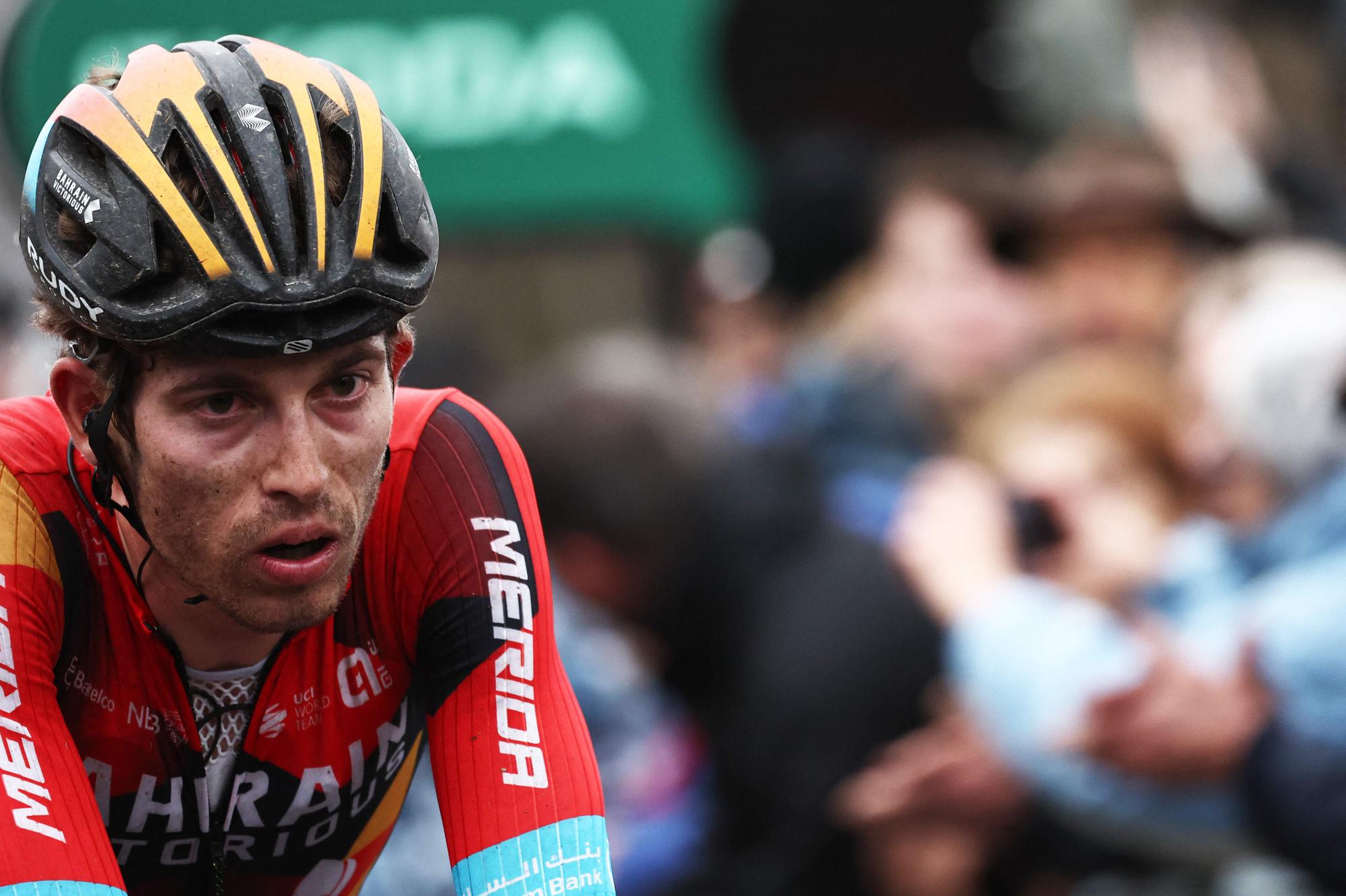 (FILES) Bahrain-Victorious' Swiss rider Gino Mader reacts after crossing the finish line during the 4th stage of the 81st Paris - Nice cycling race, 165 km between Saint-Amand-Montrond and La Loge des Gardes, central-France, on March 8, 2023. Swiss Cyclist Gino Mader dies from injuries after plunging into ravine on Tour of Switzerland, his team announced on June 16, 2023. (Photo by ANNE-CHRISTINE POUJOULAT / AFP)