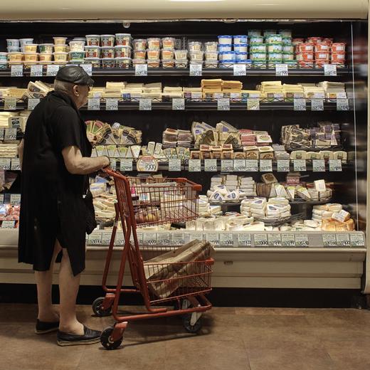 A man shops at a supermarket on Wednesday, July 27, 2022, in New York. An inflation gauge that is closely tracked by the Federal Reserve, Friday, July 29, jumped 6.8% in June from a year ago, the biggest increase in four decades, and leaving Americans with no relief from surging costs. (AP Photo/Andres Kudacki)