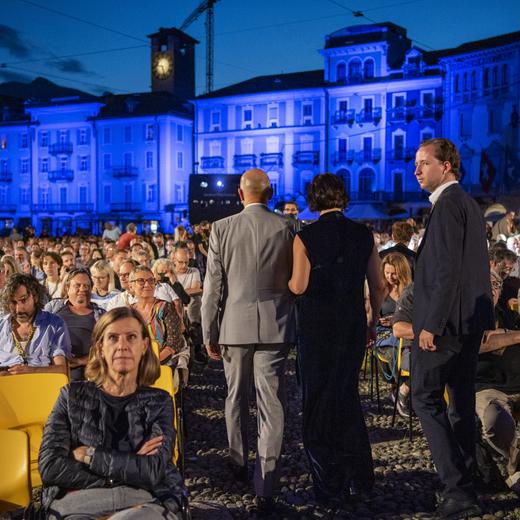 Swiss Federal Councillor Alain Berset, left, his wife Muriel, right, on the Piazza Grande on the 74th Locarno International Film Festival in Locarno, Switzerland, Friday, August 6, 2021. The Festival del film Locarno runs from 4 to 14 August 2021. (KEYSTONE/Urs Flueeler)