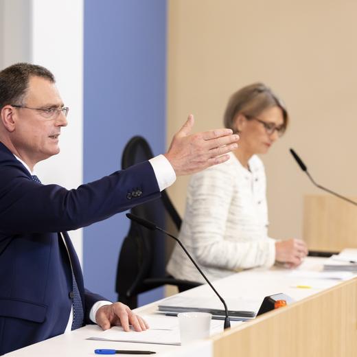 epa10705681 Swiss National Bank (SNB) Governing Board Chairman Thomas Jordan (L) gestures next to Member of the Governing Board Andrea Maechler during a media briefing at the SNB headquarters in Zurich, Switzerland, 22 June 2023. Swiss National Bank (SNB) announced on 22 June that it raised its policy interest rate to 1.75 percent to fight inflation. EPA/MICHAEL BUHOLZER