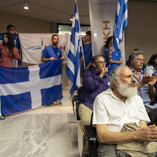 Supporters attend an election rally of Niki party, in Athens, Greece, Thursday, June 22, 2023. Three far-right and two far-left, could conceivably cross the 3% parliamentary entry threshold in Sunday's elections, despite a swing back to mainstream politicians as the scars of Greece's 10-year financial crisis gradually heal. (AP Photo/Yorgos Karahalis)