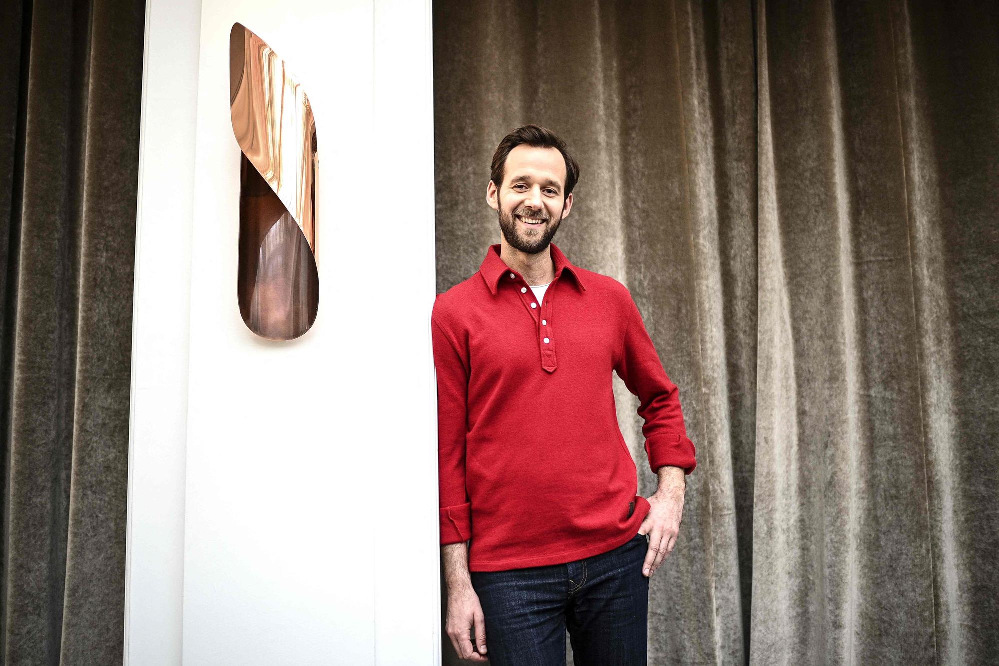 (FILES) French actor Benjamin Lavernhe, a member of the permanent troupe of the Comedie Francaise state theatre, poses during a photo session in Paris on December 15, 2020. (Photo by Christophe ARCHAMBAULT / AFP)
