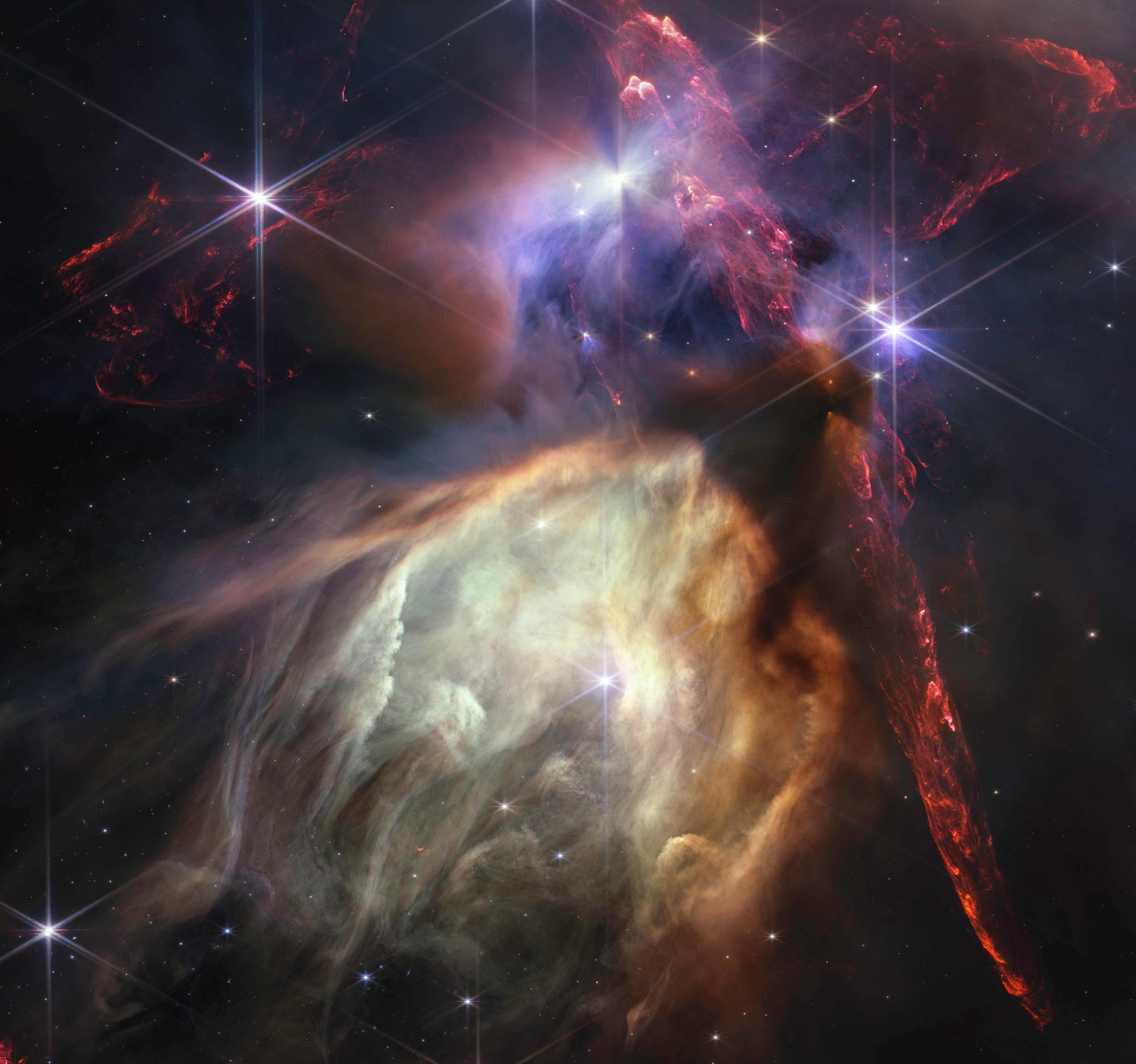 Jul 12, 2023: The first anniversary image from s James Webb Space Telescope displays star birth like it s never been seen before, full of detailed, impressionistic texture. The subject is the Rho Ophiuchi cloud complex, the closest star-forming region to Earth. It is a relatively small, quiet stellar nursery, but you d never know it from Webb s chaotic close-up. Jets bursting from young stars crisscross the image, impacting the surrounding interstellar gas and lighting up molecular hydrogen, shown in red. Some stars display the telltale shadow of a circumstellar disk, the makings of future planetary systems. James Webb Solar System - ZUMAz03_ 20230712_int_z03_797 Copyright: xNASAx