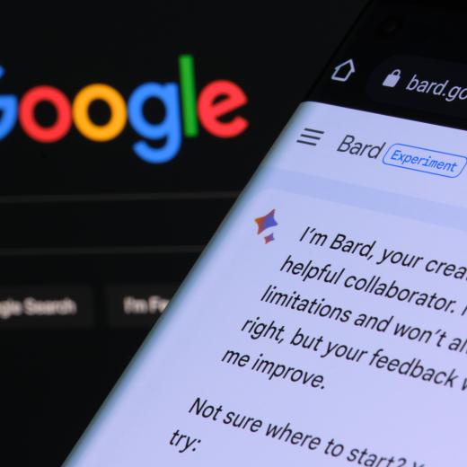 Google Bard AI chatbot. Real example of chat bot seen on the screen of device and Google logo on background. Stafford, United Kingdom, March 22, 2023