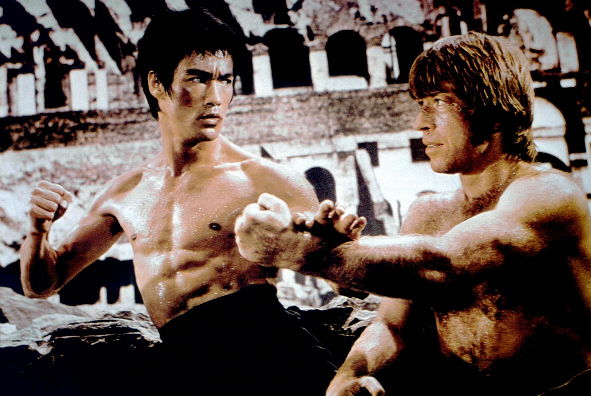 Chinese American martial artist, actor, director and screenwriter Bruce Lee (left) and American martial artist Chuck Norris on the set of their movie Meng Long Guo Jiang (The Way of the Dragon). (Photo by Concord Productions Inc./Golden Harvest Company/Sunset Boulevard/Corbis via Getty Images)