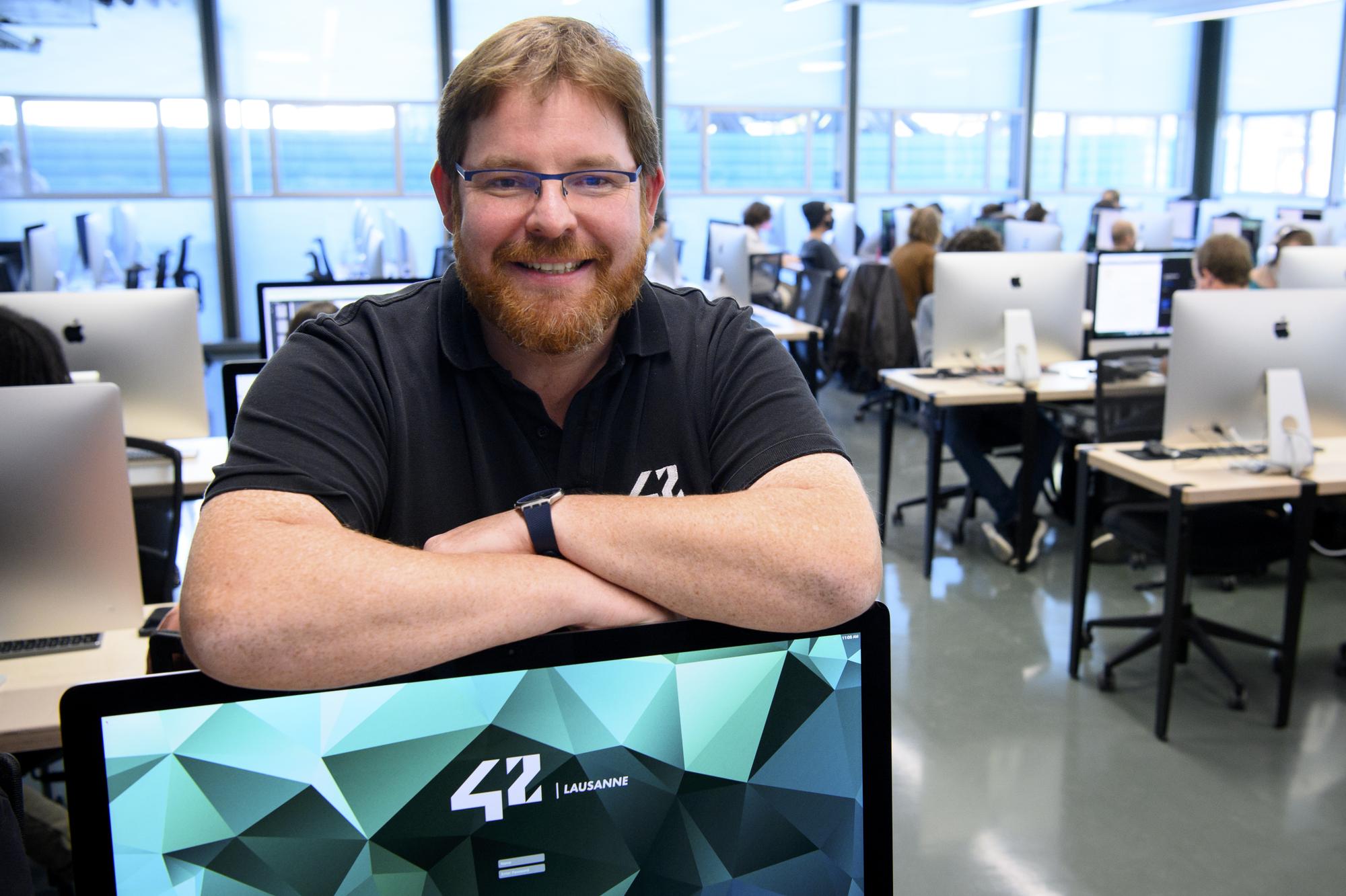 Christophe Wagniere, director of the private school "Ecole 42 Lausanne" is pictured the first day of the teacher-less coding private school "Ecole 42 Lausanne", in Renens, Monday, October 11, 2021. 42 Lausanne, the first campus of 42 in Switzerland, will open its doors in June. As of October 2021, 180 students will be trained in computer programming with an innovative pedagogy based on Peer-to-Peer Learning and Gaming. (KEYSTONE/Laurent Gillieron)