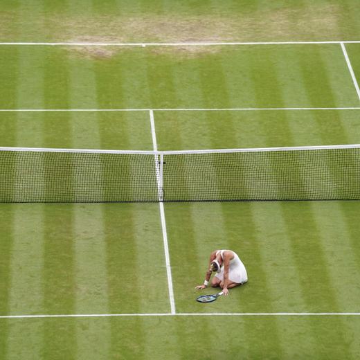 Czech Republic's Marketa Vondrousova celebrates after beating Tunisia's Ons Jabeur to win the final of the women?s singles on day thirteen of the Wimbledon tennis championships in London, Saturday, July 15, 2023. (Adam Davy/PA via AP)