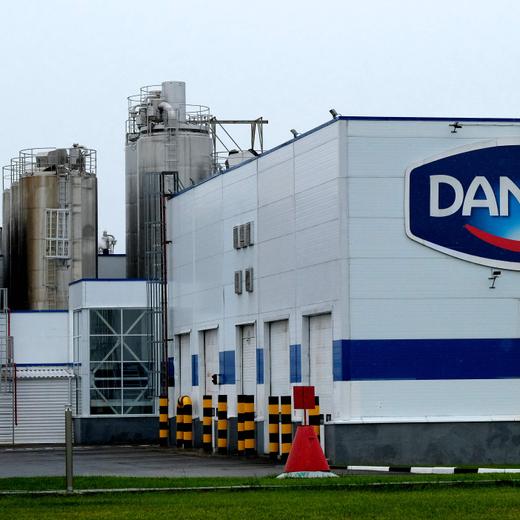(FILES) This general view shows French Dairy firm Danone's Russian plant near Chekhov, outside Moscow on July 22, 2017. Russia took control of shares belonging to French agribusiness Danone and brewer Carlsberg, according to a decree published on July 16, 2023. The decree signed by President Vladimir Putin says the Russian state would "temporarily" manage shares belonging to Danone Russia and to Baltika, which is owned by Carlsberg. (Photo by Yuri KADOBNOV / AFP)
