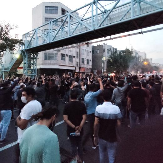 A picture obtained by AFP outside Iran on September 21, 2022, shows Iranian demonstrators taking to the streets of the capital Tehran during a protest for Mahsa Amini, days after she died in police custody. Protests spread to 15 cities across Iran overnight over the death of the young woman Mahsa Amini after her arrest by the country's morality police, state media reported today.In the fifth night of street rallies, police used tear gas and made arrests to disperse crowds of up to 1,000 people, the official IRNA news agency said. (Photo by AFP)